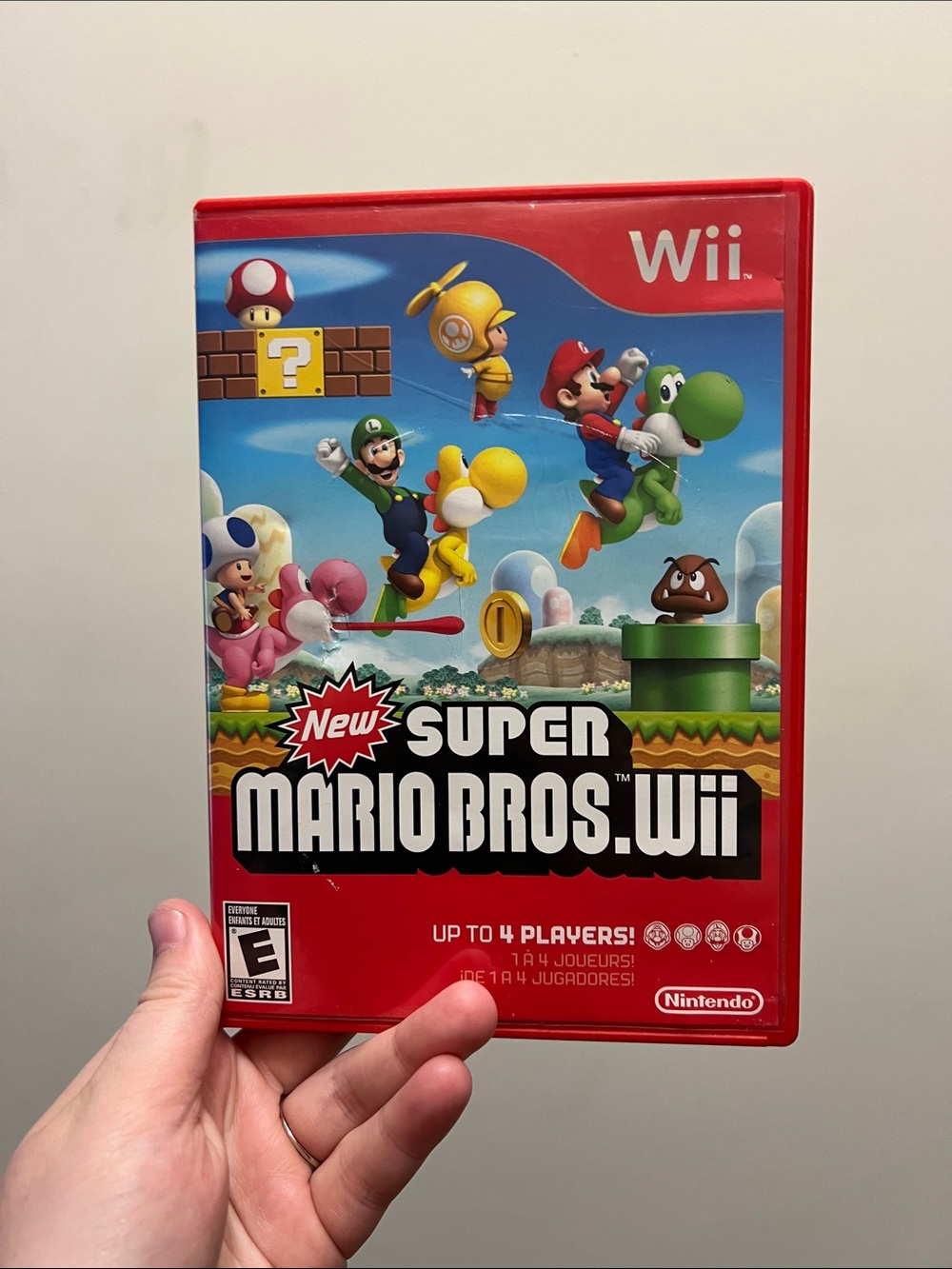 Nintendo New Super Mario Bros. Wii - Red & Multicolor Cover